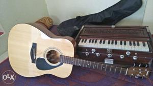 Brown Acoustic Guitar 23 days old new guitar with harmonium