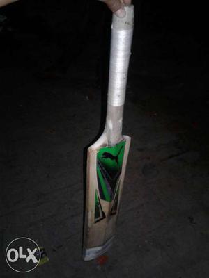 Gray And Green PUMA Cricket Paddle