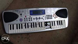Grey Casio Electric Keyboard