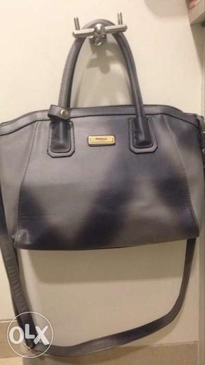 Grey shaded spacious imported bag used once, no
