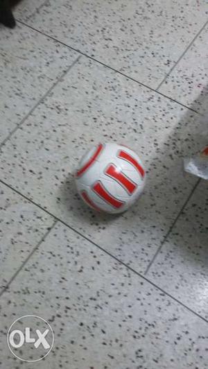 It is red colour football of cosco only 1day old