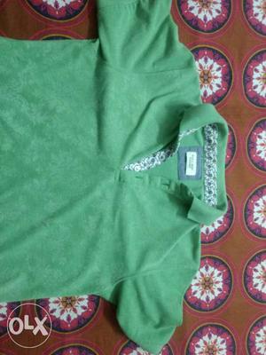 Its Zara man's polo tshirt light green in color