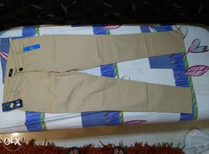 Ladies Beige color trousers...Size 30... Brand new
