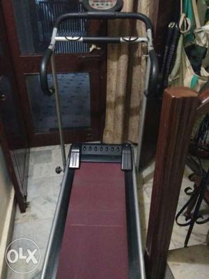 Maroon And Black Treadmill and Cycle