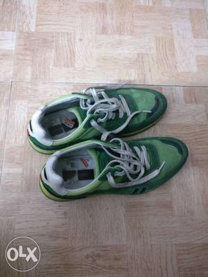 Pair Of Green Low Tops Sneakers urgent sell my shoe