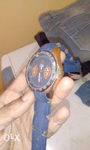 Round Black Face Watch With Blue Strap