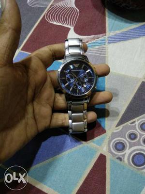 Round Blue And Silver Chronograph Watch