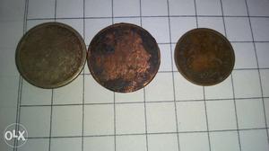 Three Bronze Round Coins