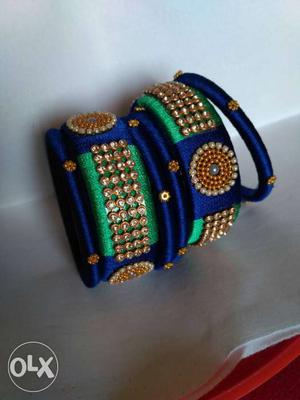 Two Blue, White And Yellow Silk Thread Beaded Bangles