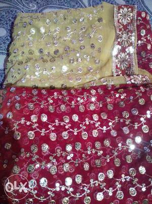 Two Red And Yellow Glittered Textiles