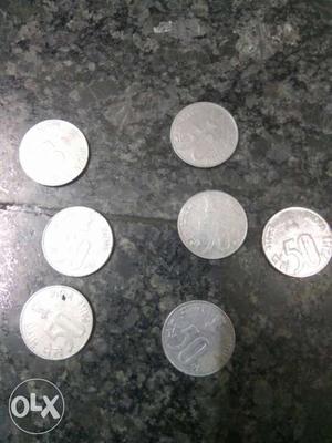 Very old 7 50p coins