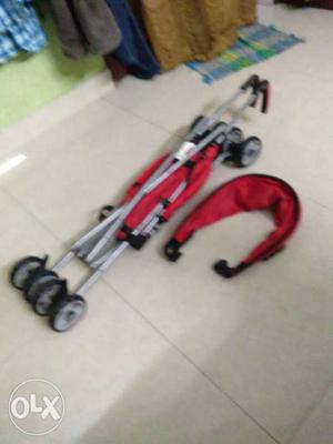 Baby's Black And Red Stroller