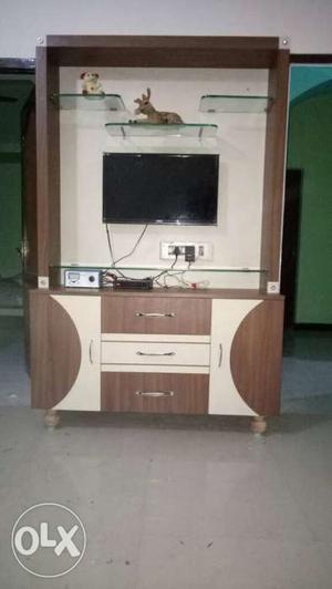 Beige And Brown Wooden TV Hutch With Wall Mounted Flat