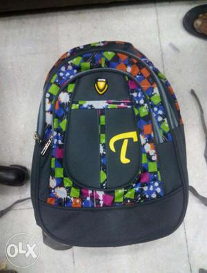 Black, Green And Blue Backpack