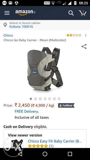 Box packed Chicco baby carrier 2 months old.
