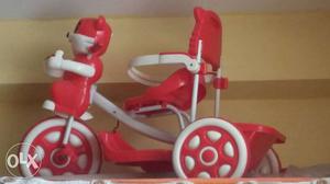 Children's White And Red Plastic Trike