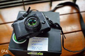Fuji X-10 Camera with F2.o  Zoom lens