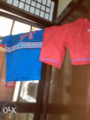 Red Shorts And Blue Polo Shirt