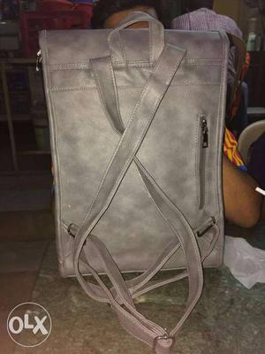 Rich grey leather bag with one big pocket for