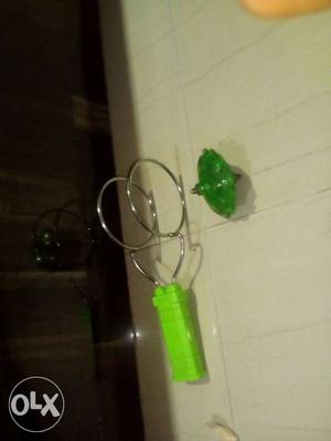 Round Green Spinner Toy With Handle