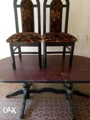 SixBlack Wooden Chairs nd table