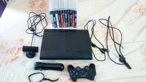 Sony PS3 Superslim Console, Move Controller And Game