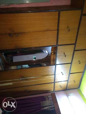 Wall wooden wardrobe in a good condition, size
