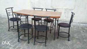 Wodden Top folding dining table with six rot iron chairs