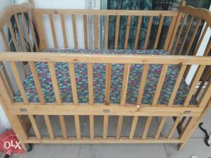 Wooden cradle with stand and net in good