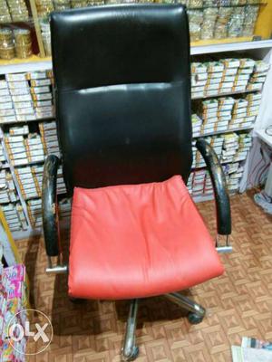 Black And Orange Leather Rolling Armchair