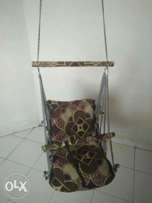 Brown And Gray Swing Chair