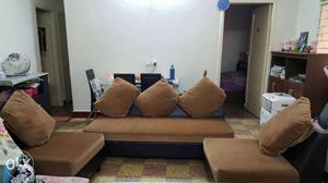 Brown Sofa And Two Sofa Chairs