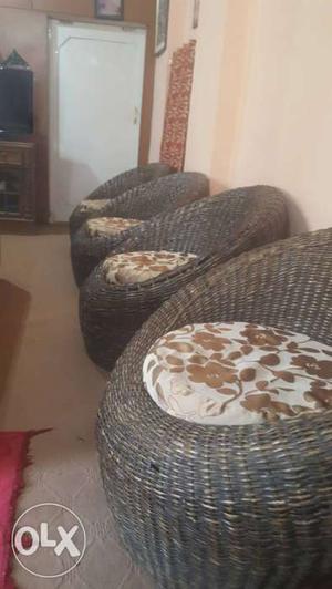 Four Brown Woven Chairs