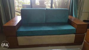 Living room sofa in good condition with storage