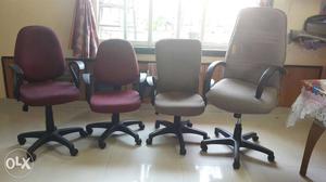 Two Maroon And Two Gray Office Rolling Armchairs