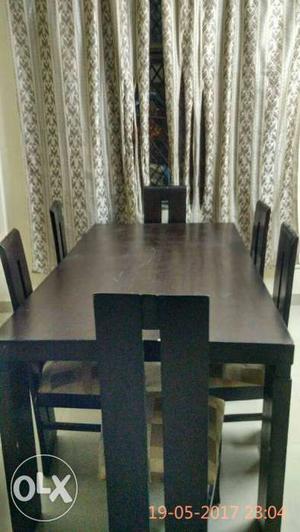 6 seater wooden dining table with chairs