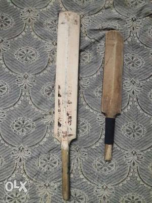 Beige And Brown Wooden Paddles