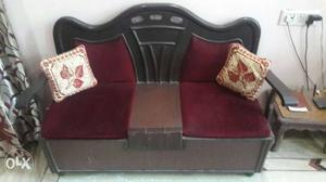 Black And Maroon Loveseat With storage space and Two Throw
