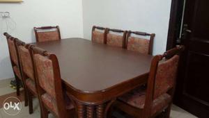 Brown Wooden Framed Padded 9-piece Dining Set