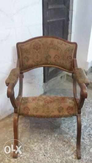 Brown Wooden Framed With Beige Floral Pad Armchair