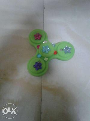 Green With Blue,red And Teal Floral Design Fidget Spinner