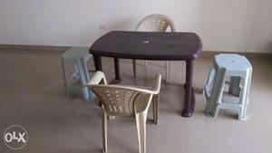 National 4 seater fibre table, 2 fibre chairs, 2