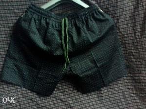 Pair Of Green Drawstring Shorts