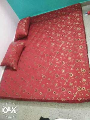 Red And Beige Floral Mattress With Bolster Pillows