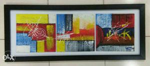 Red, Yellow, And Blue Abstract Artwork With Black Frame