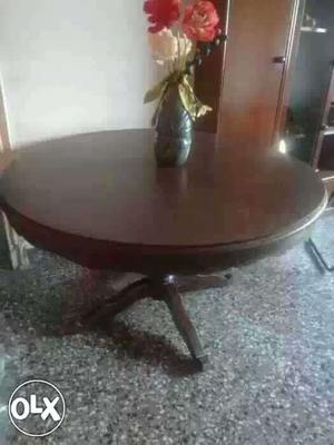 Round Brown Wooden Table