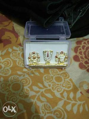Three Gold-and-diamond Pendants