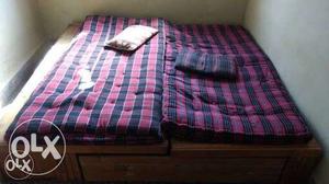 Two Black-and-red Striped Tufted Mattresses