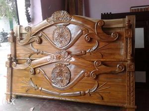 Two Scrolled Brown Wooden Headboards