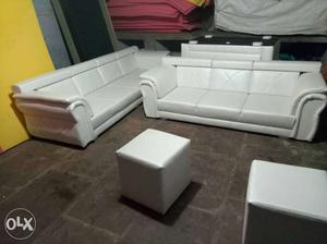 Two White Leather Padded 3-seat Sofa With Two Ottomans